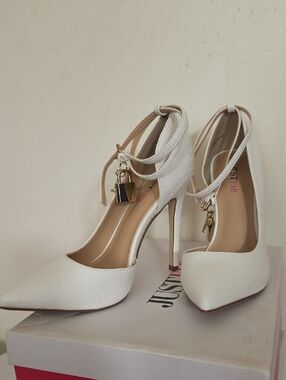 White Pointed Toe Ankle-Wrap Stiletto Heels with Gold Padlock Accent